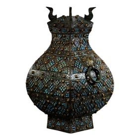 A square-topped bottle with double ring handles and inlaid gold and silver from the Warring States