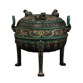 A three-legged, double-eared incense burner inlaid with gold and silver from the Warring States