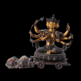 A partially gilt bronze seated Buddha statue from the Qianlong period of the Qing Dynasty in China.