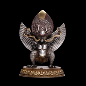 Gilt bronze and silver garuda statue