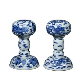 A pair of Chinese Qing Dynasty blue and white porcelain official hat racks with animal patterns