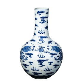 Blue and white porcelain vase with double dragons playing with a pearl design from the Kangxi period