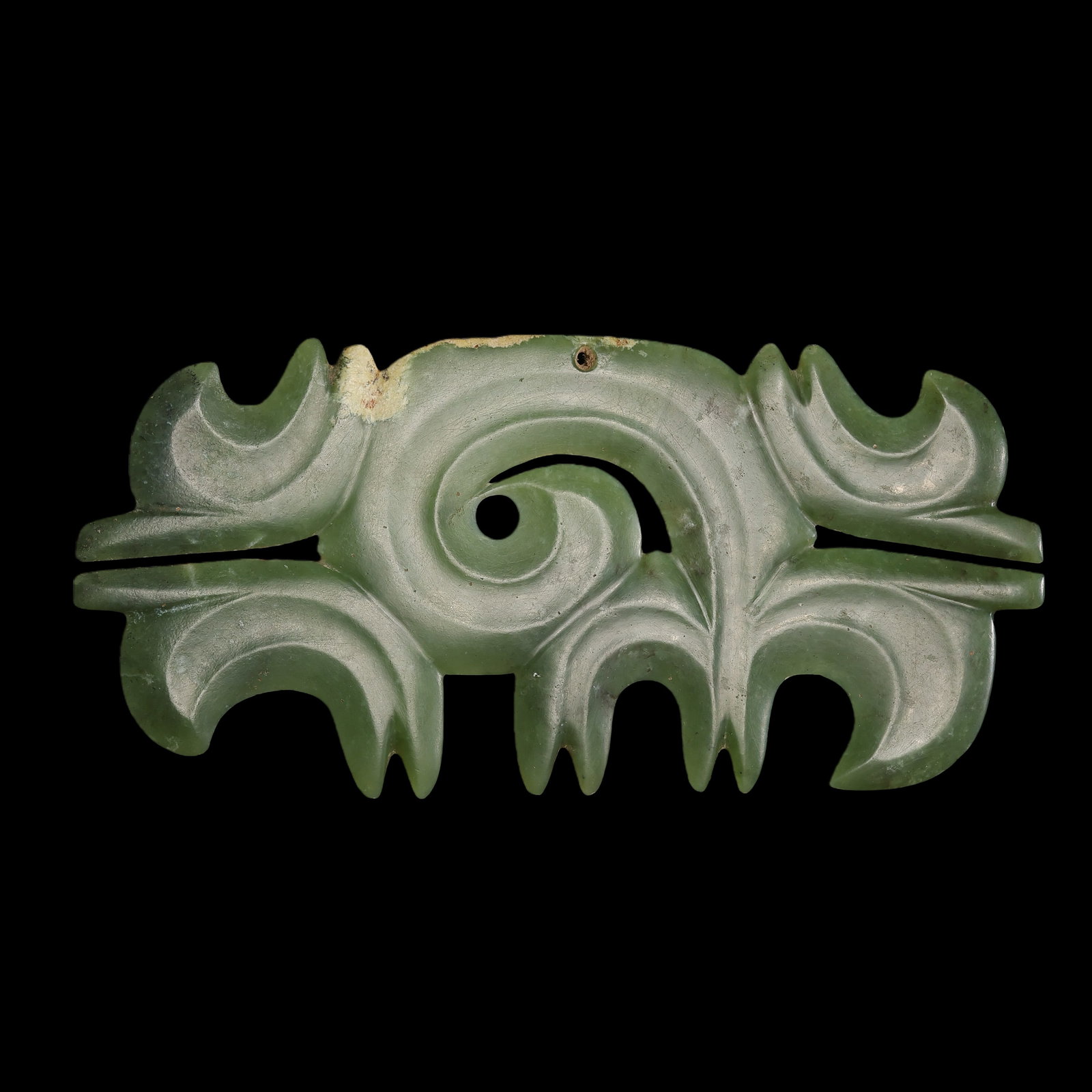 Jade pendant with cloud pattern from the Hongshan period in China: L. 22 cm. W. 10 cm. Weight 198 gram.