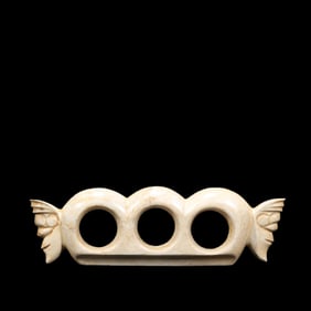 Three-holed chicken-bone white jade artifact from the Hongshan period in China
