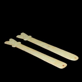 A pair of Chinese Hongshan period jade artifacts