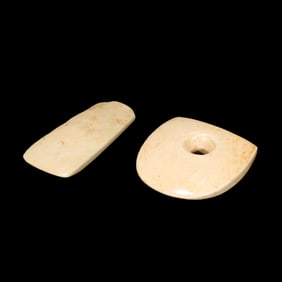 A pair of Chinese Hongshan period jade artifacts