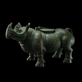bronze rhinoceros-shaped vessel inlaid with gold and silver from the Warring States period of China.