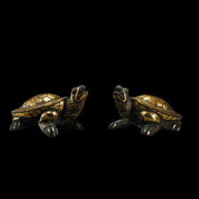 A pair of bronze tortoises inlaid with gold and silver from the Warring States period of China