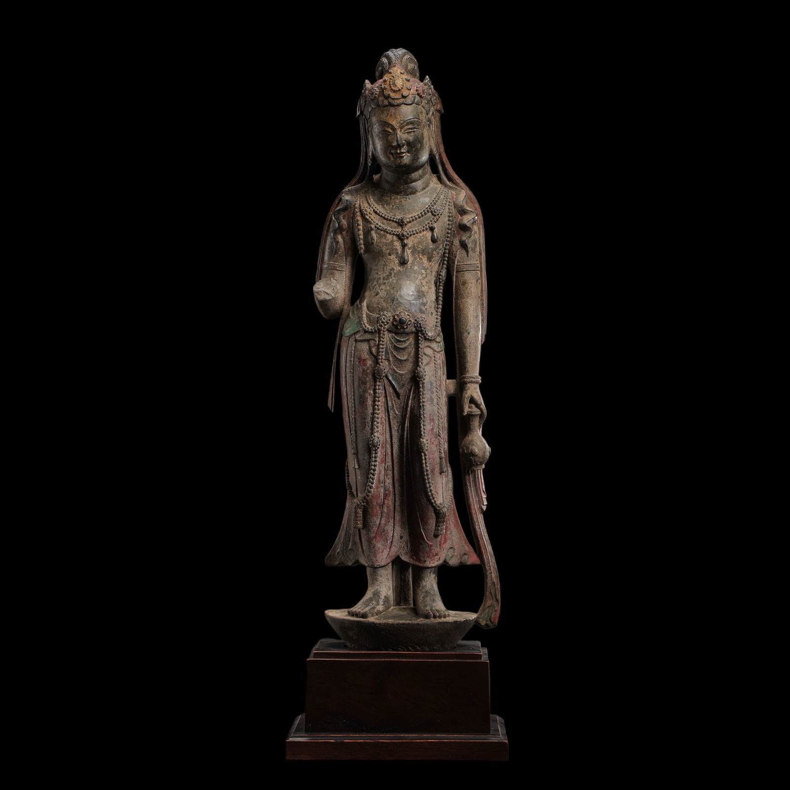 A standing Buddha statue painted on bluestone during the Northern Wei Dynasty in China (1 of 10)