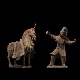 A set of painted pottery horse-leading figurines from the Han Dynasty of China