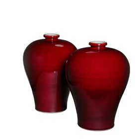 A pair of Chinese red-glazed bottles from the Xuande period of the Ming Dynasty