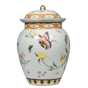 A covered jar with famille rose floral and butterfly design from the Guangxu period of the Qing