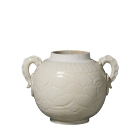 A white porcelain jar with floral design and the character "?" (official) mark from the Ding kiln