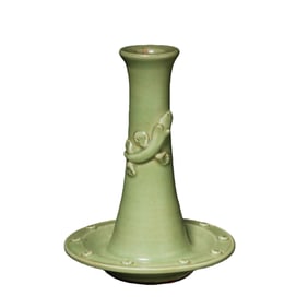 Longquan celadon candlestick with dragon design from the Yuan Dynasty in China