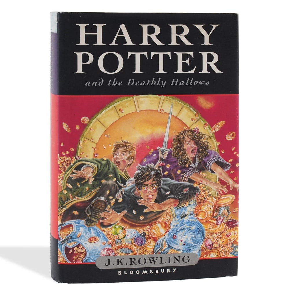 J.K. ROWLING SIGNED "HARRY POTTER AND THE DEATHLY HALLOWS" FIRST EDITION: 8 1/8 x 5 3/8 in (20.5 x 13.6 cm) Few modern literary works have achieved the worldwide influence and cultural significance of the Harry Potter series. Written by J.K. Rowling, the books transformed