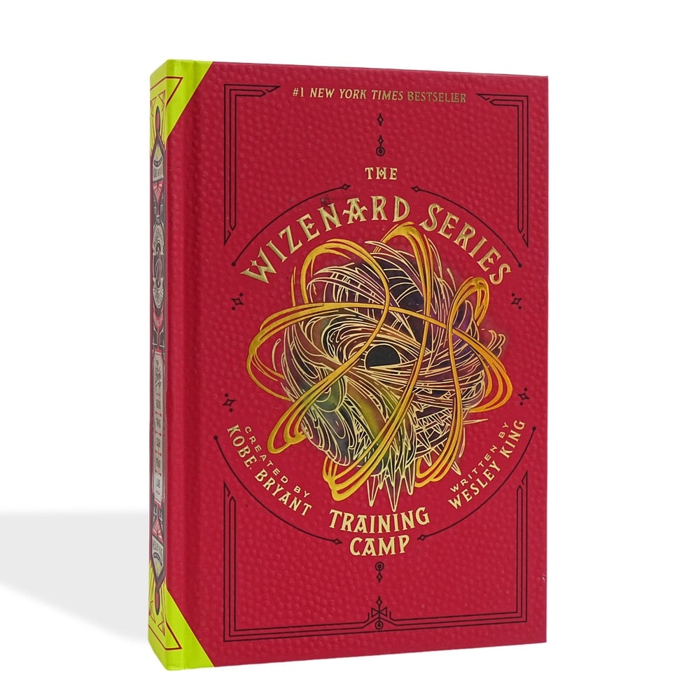 KOBE BRYANT SIGNED "THE WIZENARD SERIES: TRAINING CAMP" FIRST EDITION: 9 1/4 x 6 1/4 in (23.6 x 15.8 cm) A First Edition of The Wizenard Series: Training Camp, created by Kobe Bryant and written by Wesley King, personally signed by Kobe Bryant on the title page.