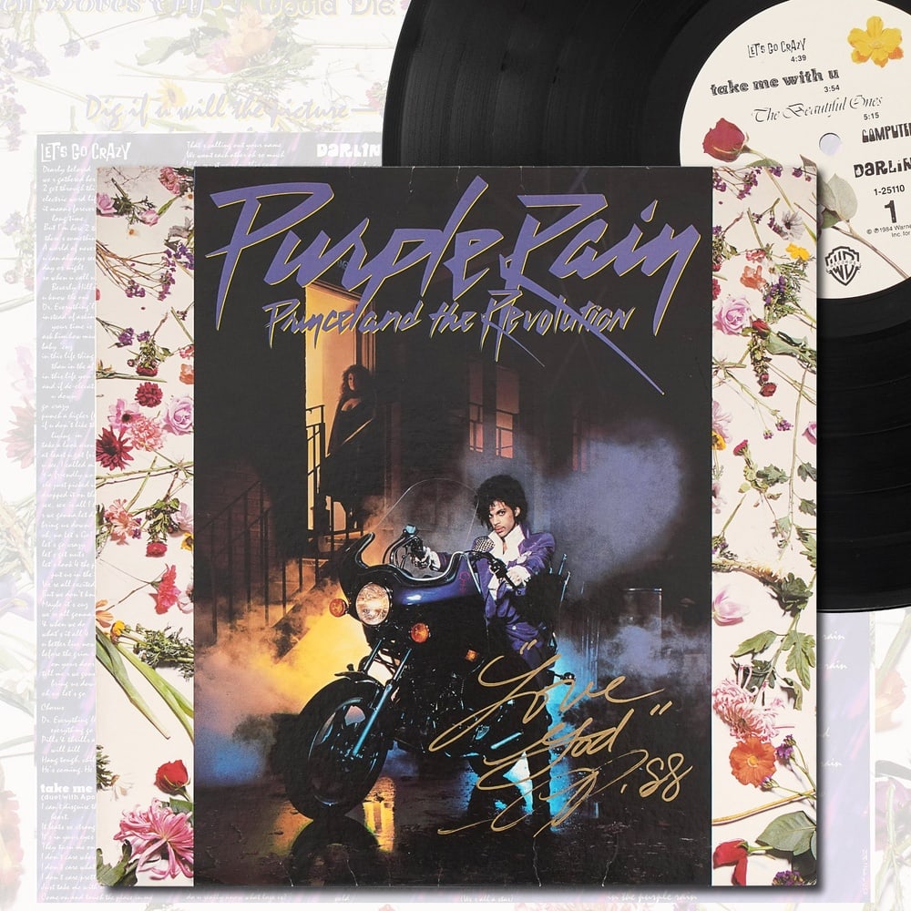 PRINCE SIGNED "PURPLE RAIN" LP: 12 1/4 x 12 1/4 in Provenance and Authentication: This collectible has undergone a rigorous forensic evaluation. The signatures were carefully analyzed across multiple criteria, including ink