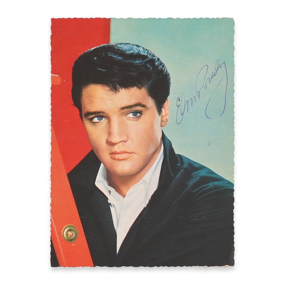 ELVIS PRESLEY SIGNED POSTCARD: 5 5/8 x 3 7/8 in (14.4 x 9.9 cm) This signed postcard is associated with Elvis Presley, one of the most influential cultural figures of the twentieth century and a defining force in the evolution of