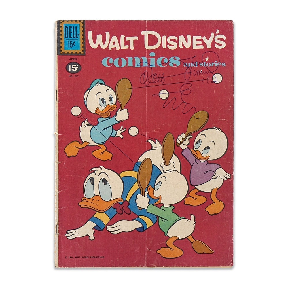WALT DISNEY SIGNED "WALT DISNEY'S COMICS AND STORIES" NO. 247 (APRIL 1961): 10 1/4 x 7 1/4 in (26 x 18.5 cm) A signed copy of Walt Disney's Comics and Stories No. 247, published by Dell Publishing in April 1961, featuring Donald Duck and his nephews on the front cover. The se
