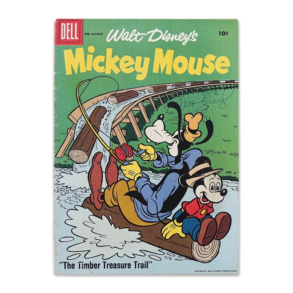 WALT DISNEY SIGNED "WALT DISNEY'S MICKEY MOUSE" (FEB.-MARCH 1958): 10 1/4 x 7 1/4 in (26 x 18.5 cm) A signed copy of Walt Disney's Mickey Mouse, published by Dell Publishing for the February-March 1958 issue, featuring the story "The Timber Treasure Trail." As one of