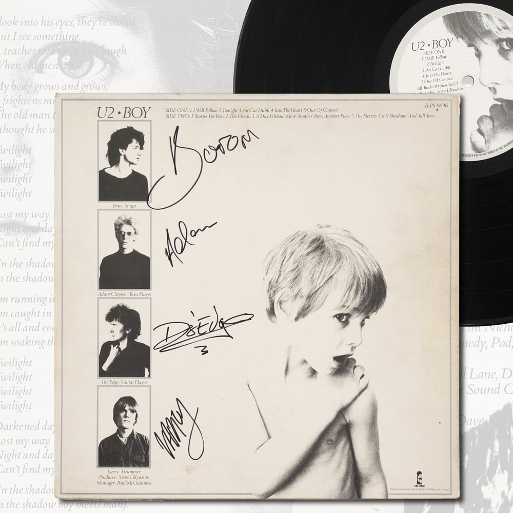 U2 FULLY SIGNED "BOY" LP: 12 1/4 x 12 1/4 in Provenance and Authentication: According to the Letter of Authenticity (LOA) and Certificate of Authenticity (COA) provided by the consignor, this collectible was subjected to a for