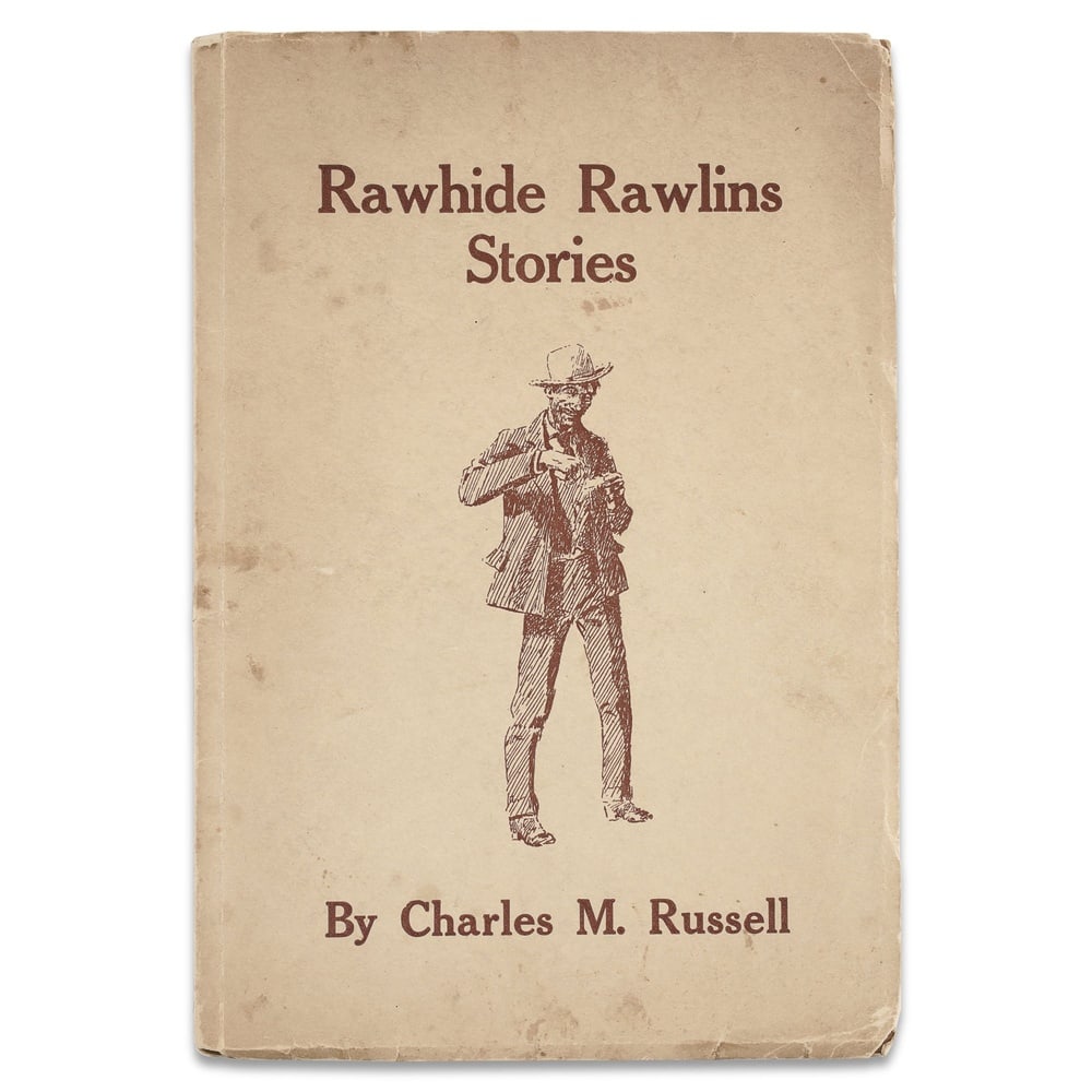 CHARLES M. RUSSELL SIGNED "RAWHIDE RAWLINS STORIES" BOOK: 10 7/8 x 7 1/2 in (27.7 x 19.2 cm) Provenance and Authentication: According to the Letter of Authenticity (LOA) and Certificate of Authenticity (COA) provided by the consignor, this collectible was su