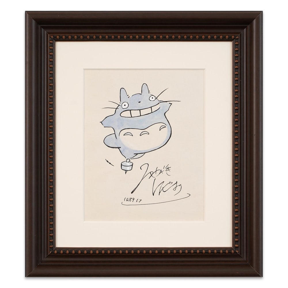 HAYAO MIYAZAKI HAND-DRAWN AND SIGNED TOTORO ILLUSTRATION: Image Dimensions: 10 5/8 x 8 3/8 in (26.9 x 21.4 cm) Framed Dimensions: 18 7/8 x 16 3/4 in (48 x 42.5 cm) Provenance and Authentication: According to the Letter of Authenticity (LOA) and Certificate