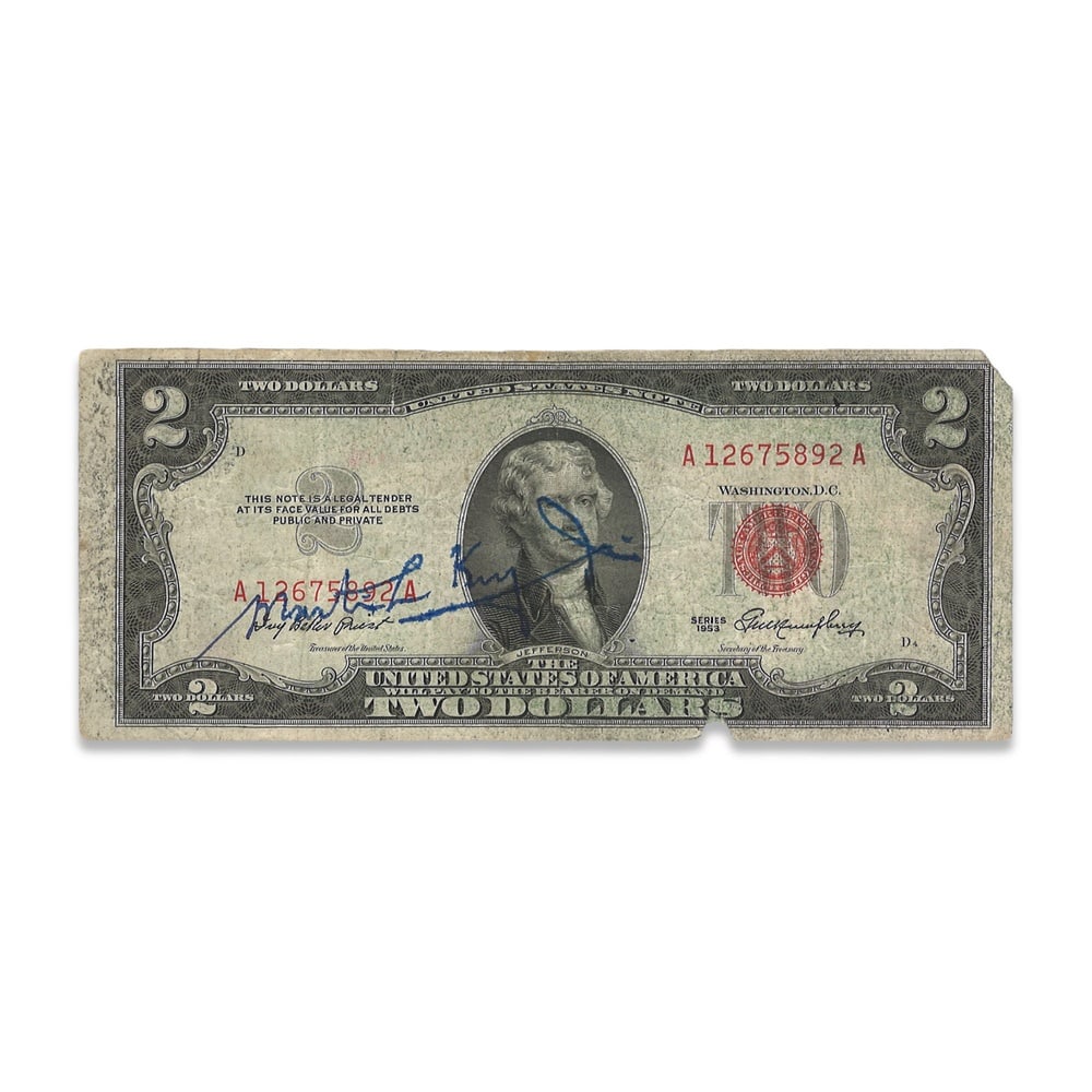 MARTIN LUTHER KING JR. SIGNED U.S. TWO DOLLAR NOTE: 6 1/8 x 2 1/2 in (15.5 x 6.5 cm) Provenance and Authentication: According to the Letter of Authenticity (LOA) and Certificate of Authenticity (COA) provided by the consignor, this collectible was