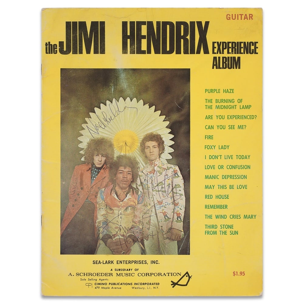 JIMI HENDRIX, NOEL REDDING & MITCH MITCHELL FULLY SIGNED GUITAR SONGBOOK: 9 x 12 in (22.8 x 30.4 cm) Provenance and Authentication: According to the Letter of Authenticity (LOA) and Certificate of Authenticity (COA) provided by the consignor, this collectible was subjected 