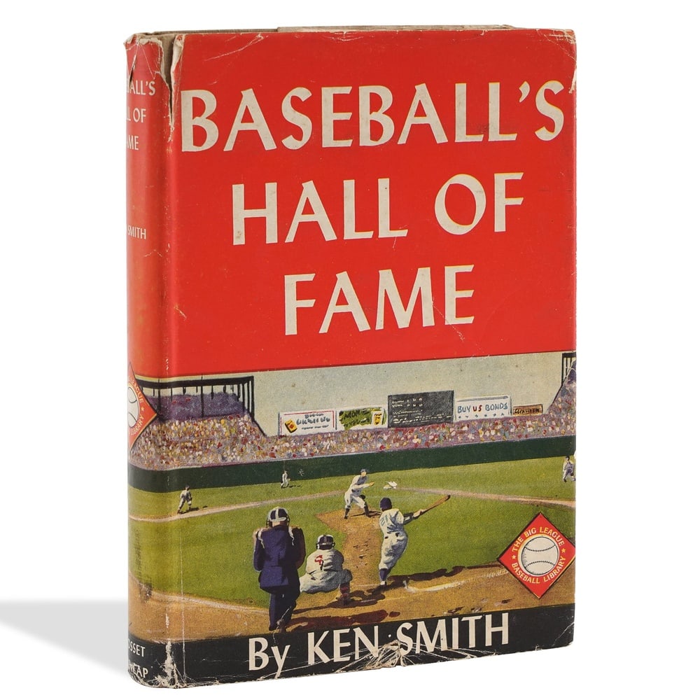 JOE DIMAGGIO & JACKIE ROBINSON SIGNED "BASEBALL'S HALL OF FAME" BOOK: 7 5/8 x 5 3/8 in (19.5 x 13.5 cm) Provenance and Authentication: According to the Letter of Authenticity (LOA) and Certificate of Authenticity (COA) provided by the consignor, this collectible was