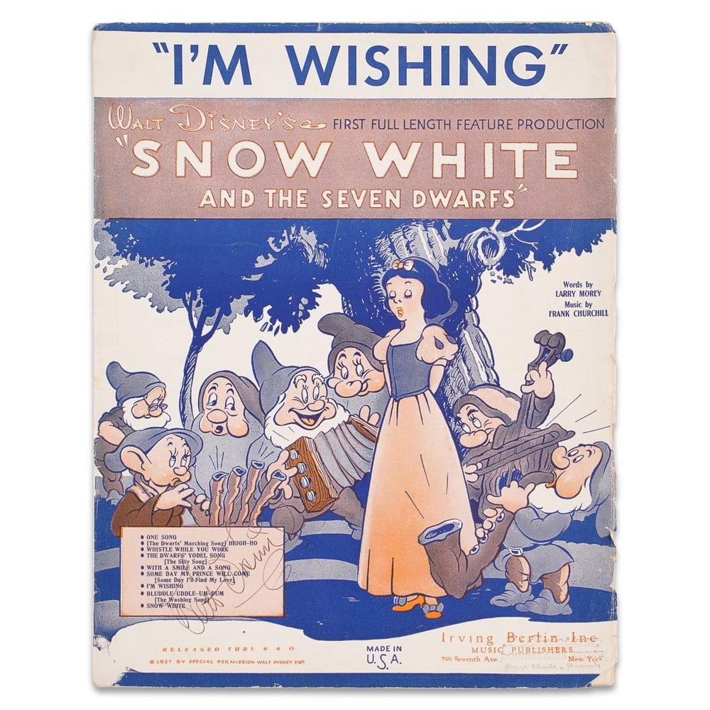 WALT DISNEY SIGNED "I'M WISHING" SHEET MUSIC FROM SNOW WHITE AND THE SEVEN DWARFS: 12 x 9 1/8 in (30.5 x 23 cm) Provenance and Authentication: According to the Letter of Authenticity (LOA) and Certificate of Authenticity (COA) provided by the consignor, this collectible was subjecte