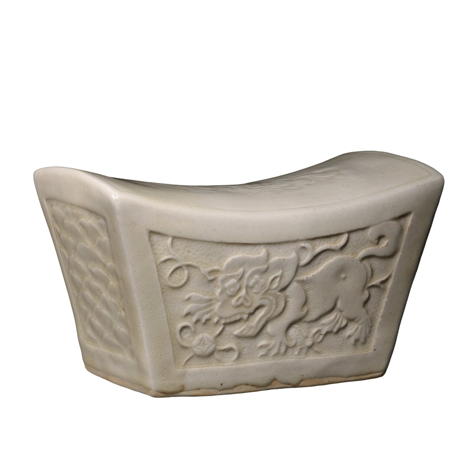 Song?Period Ding?Ware White?Glazed Mould?Printed Lion?Motif Ingot?Shaped Porcelain: Dimensions: Length 19 cm (7.48 in), Height 11.5 cm (4.53 in), 10?13th CenturyCondition & Provenance: The porcelain pillow is fully intact, glaze retains authentic antique luster, exposed base shows na