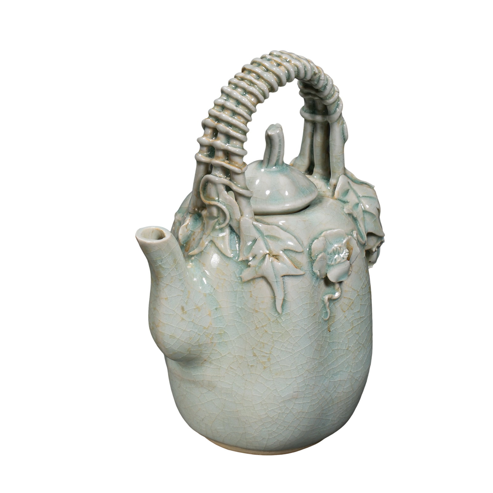 Northern Song Dynasty (11thâ€“12th Century) Qingbai Glazed Molded Melon-Form Basket Handle Ewer with: Size: Height 17 cm (approx. 6.7 in), Maximum Width 12 cm (approx. 4.7 in), 11th–12th Century?condition & Provenance: Good overall condition with the body preserved, natural glaze crackle, subtle age