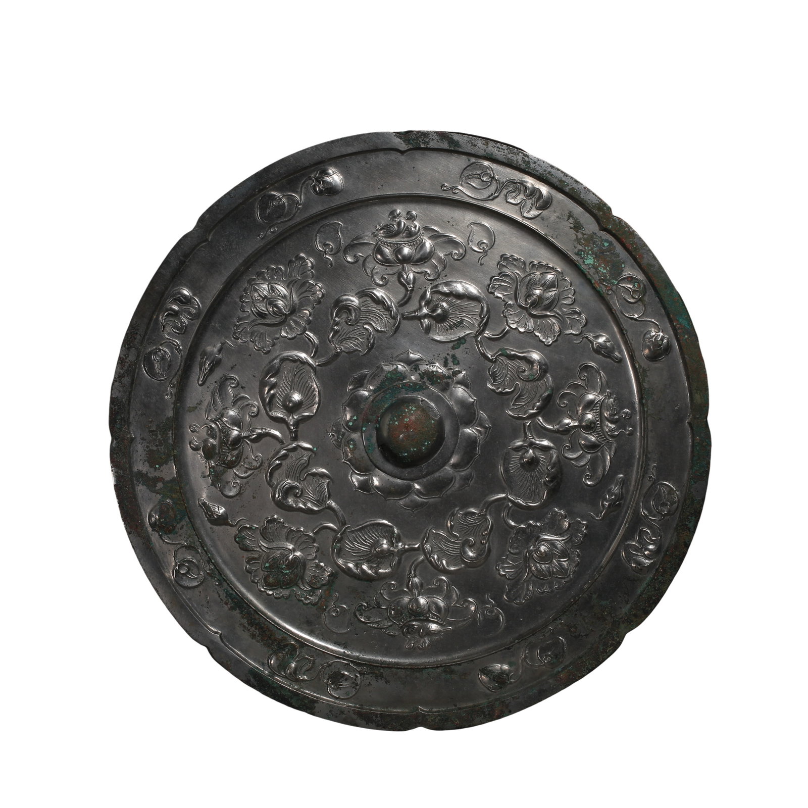 Tang Dynasty (7th–10th Century) Large Lozenge-Shaped Bronze Mirror with High-Relief Lotus Scroll: Dimensions: Diameter 29 cm / 11.42 in, Weight 2931 g / 6.46 lb, 7th–10th CenturyCondition & Provenance: The mirror is preserved in excellent overall condition with a complete body and clearly define