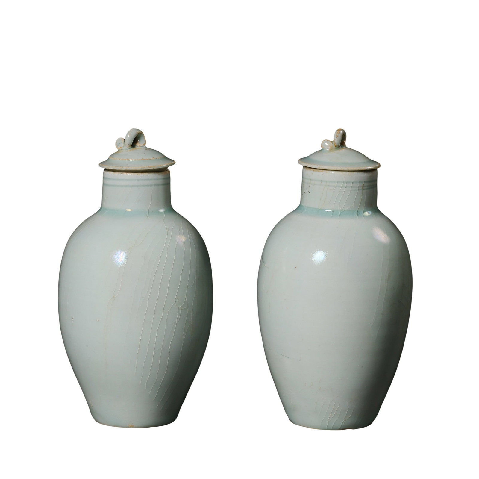 Song Dynasty Hutian Kiln Qingbai Glazed Lidded Jars with Rope-Form Knobs, Pair (11th–13th Century): Dimensions: Each jar: Height 12.5 cm (4.9 in), Diameter 6.5 cm (2.6 in), Song Dynasty (11th–13th Century), preserved as an original pair?condition & Provenance: Well preserved with matching original