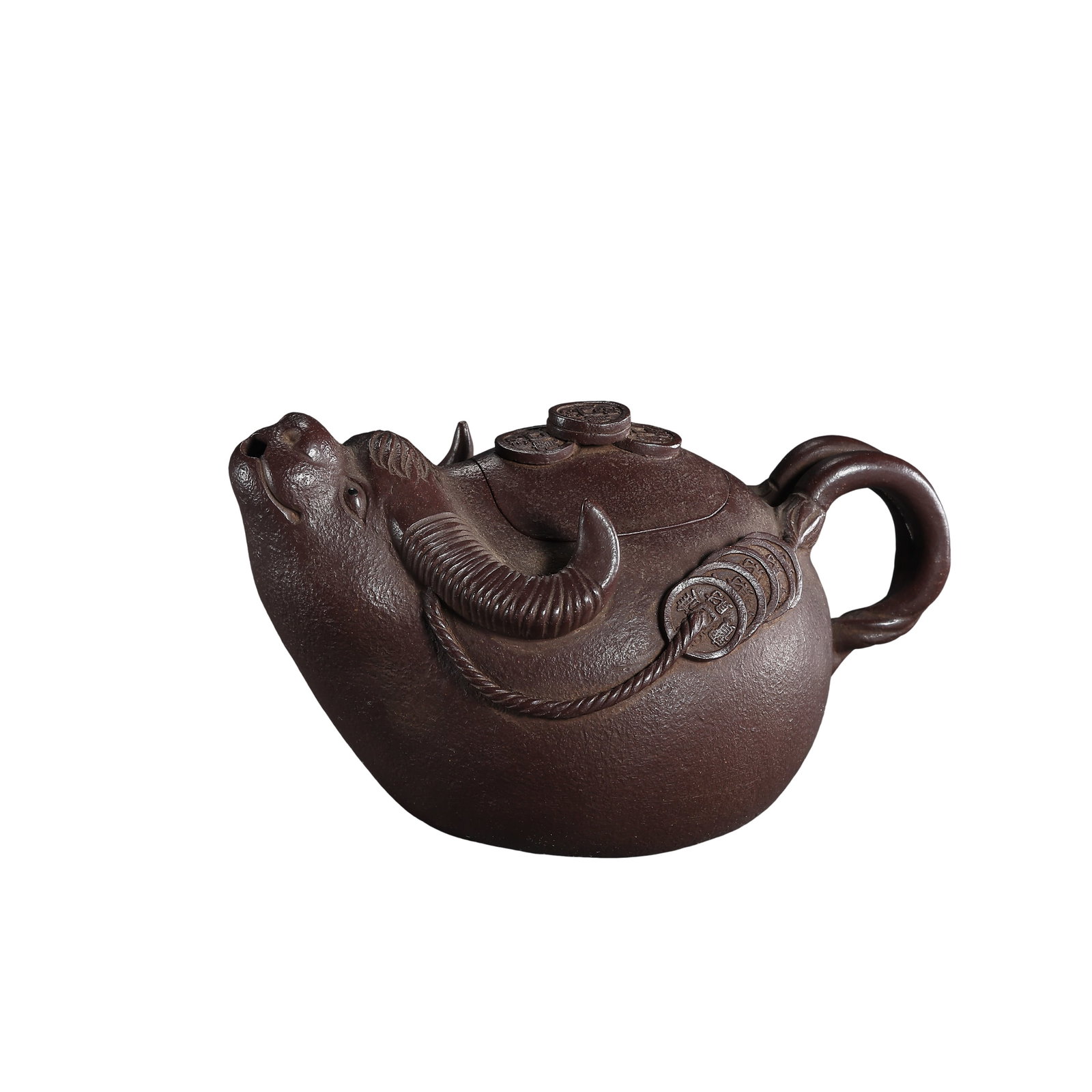Zisha Purple?Clay Fortune?Attracting Buffalo?Form Teapot, Qing Dynasty, 18th?19th Century: Measurements: Overall length 11cm (4.33 inches), overall height 6.5cm (2.56 inches), 18th?19th century Qing dynasty purple zisha clay figural buffalo teapot with coin motifsCondition & Provenance: The