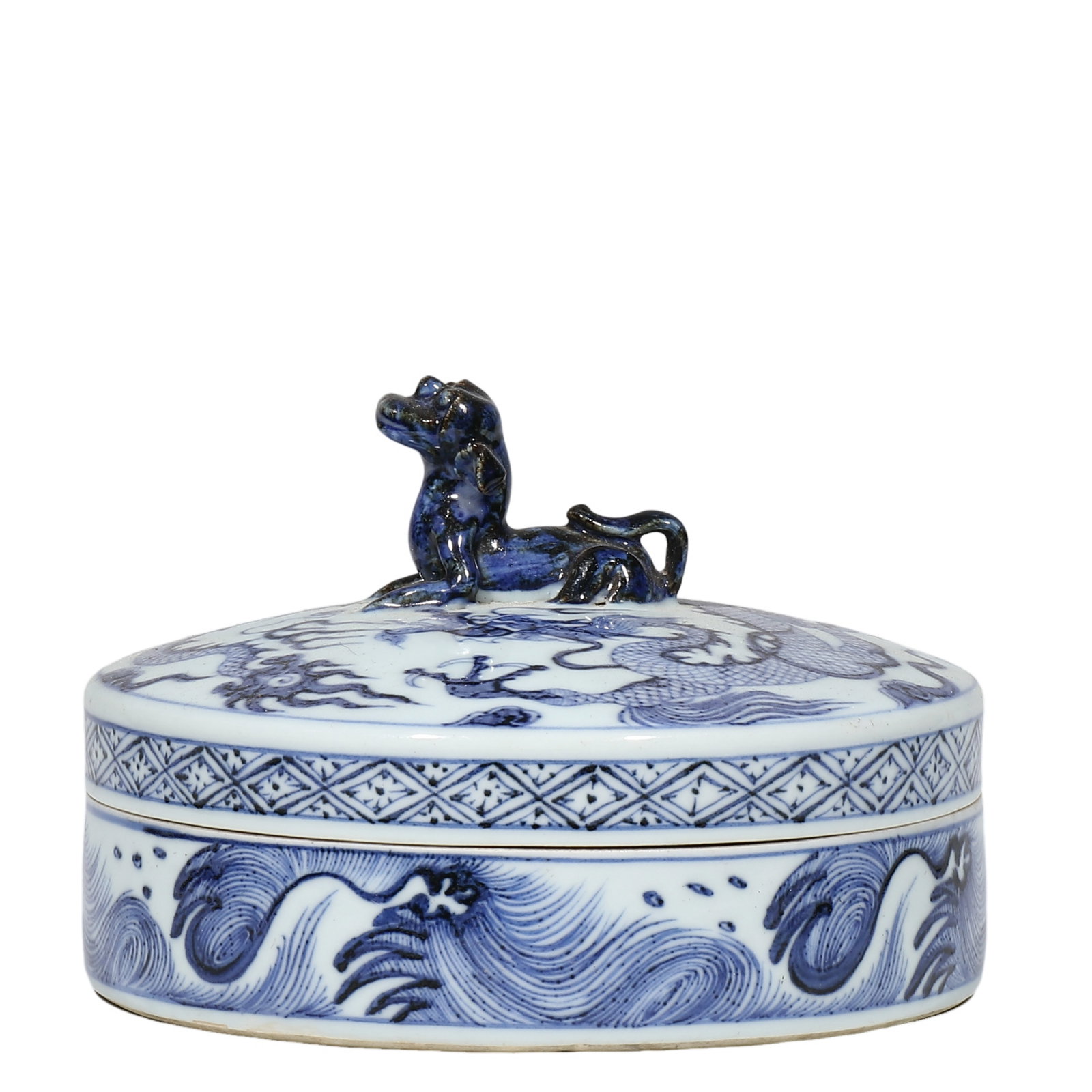 Ming Dynasty, Blue and White Circular Covered Box with Dragon?Sea?Wave Pattern and Qilin?Form: Dimensions?H.14.5cm, W.15cm Condition & Provenance?Complete set of cover and body, qilin knob intact, no cracks or chips. Glaze and cobalt decoration well preserved, natural earth patina on unglazed b