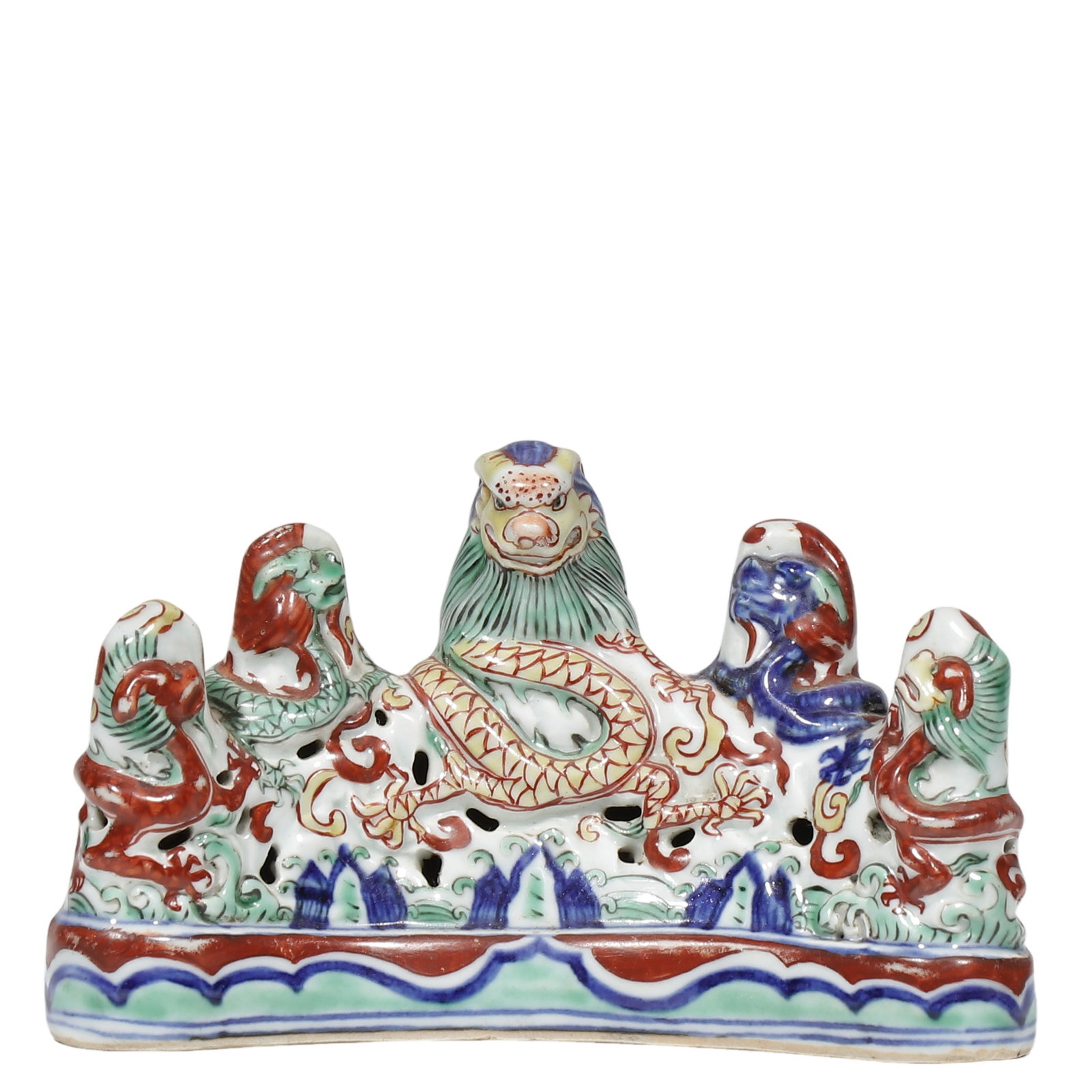 Ming Wanli Period, Wucai Open?Work Mountain?Shaped Brush Rest with Five?Dragon Motif: Dimensions?W.15cm?H.11.5cm?W.0.492ft?H.0.377ft? Condition & Provenance?Entire piece intact, well?preserved enamel pigments with minor natural age?related wear on glaze surface, aged patina on