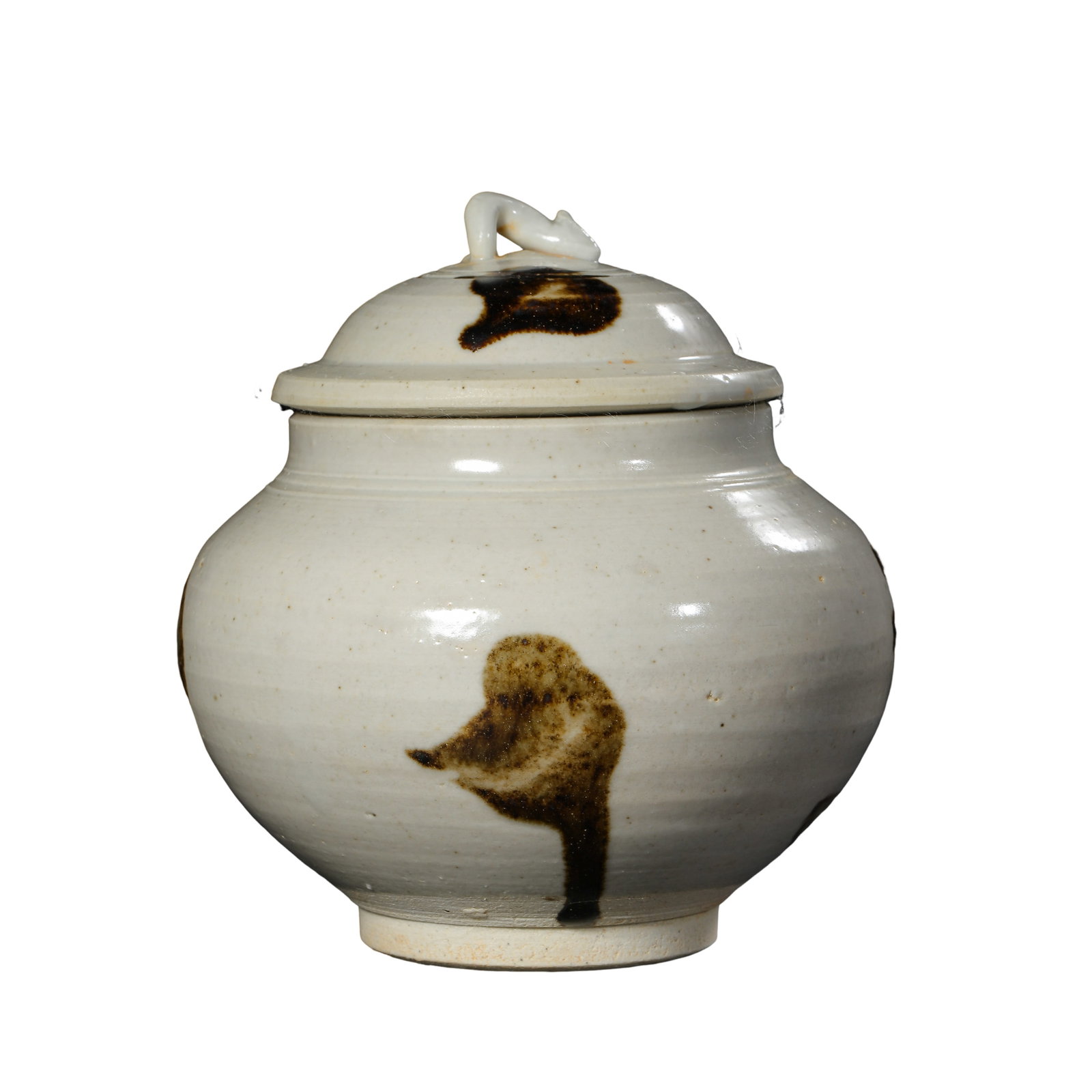 Song Dynasty Cizhou Kiln White Glazed Covered Jar with Brown Splashes and Animal-Shaped Knob: Dimensions?Overall Height 11cm (4.33 in), 10th-13th Century A.D.Condition & Provenance?The jar and its original matching lid are fully intact, free of cracks, chips or losses. Tiny grey-brown natural 