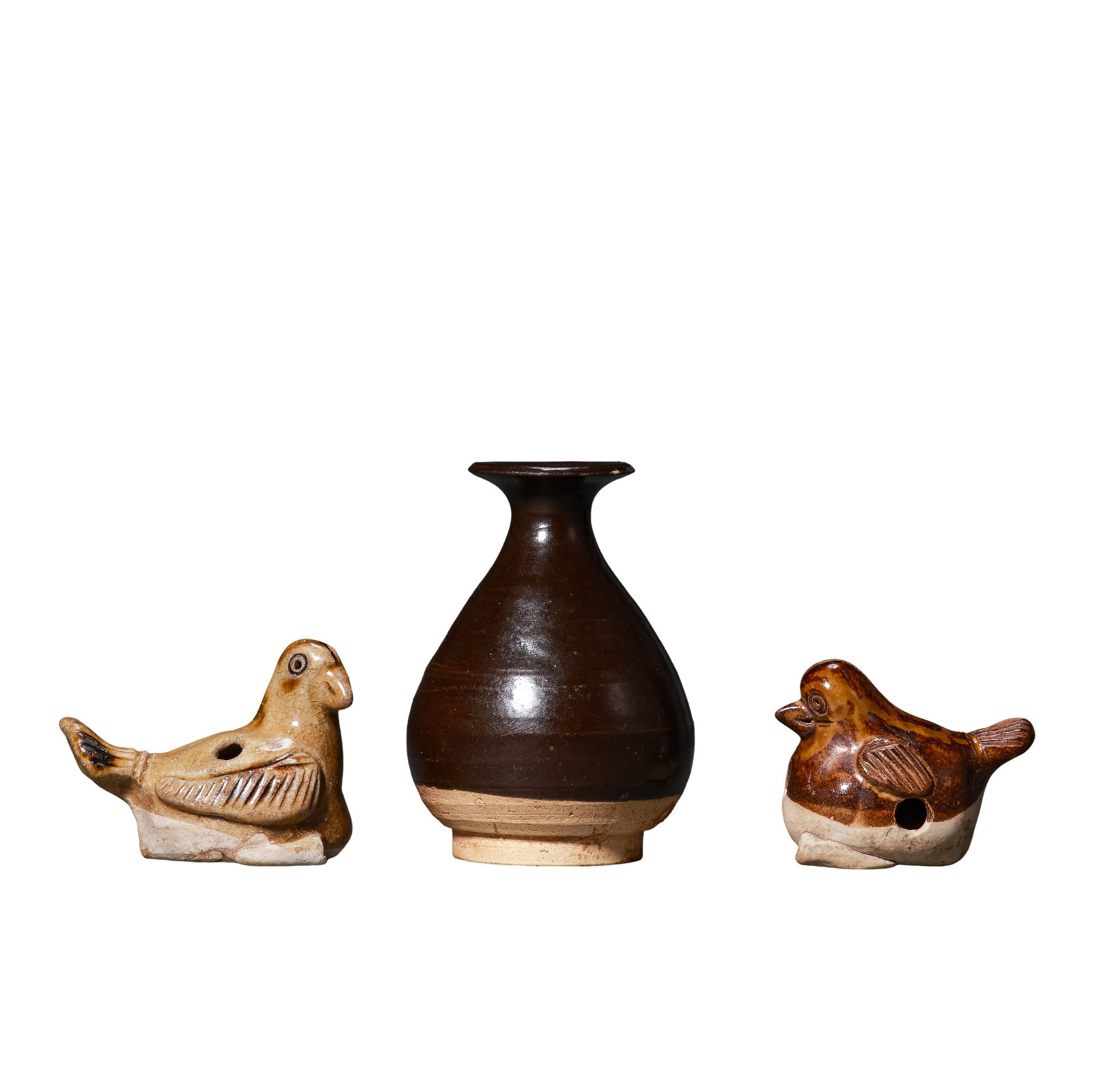 Song Dynasty Group: Cizhou?Kiln Brown?Glazed Mini Yuhuchun Vase and Two Bird?Form Whistles: Dimensions?Yuhuchun Vase: height 9cm (3.54 in), base diameter 4.8cm (1.89 in); Left bird whistle: length 6.5cm (2.56 in), height 5cm (1.97 in); Right bird whistle: length 6cm (2.36 in), 10th?13th Cent