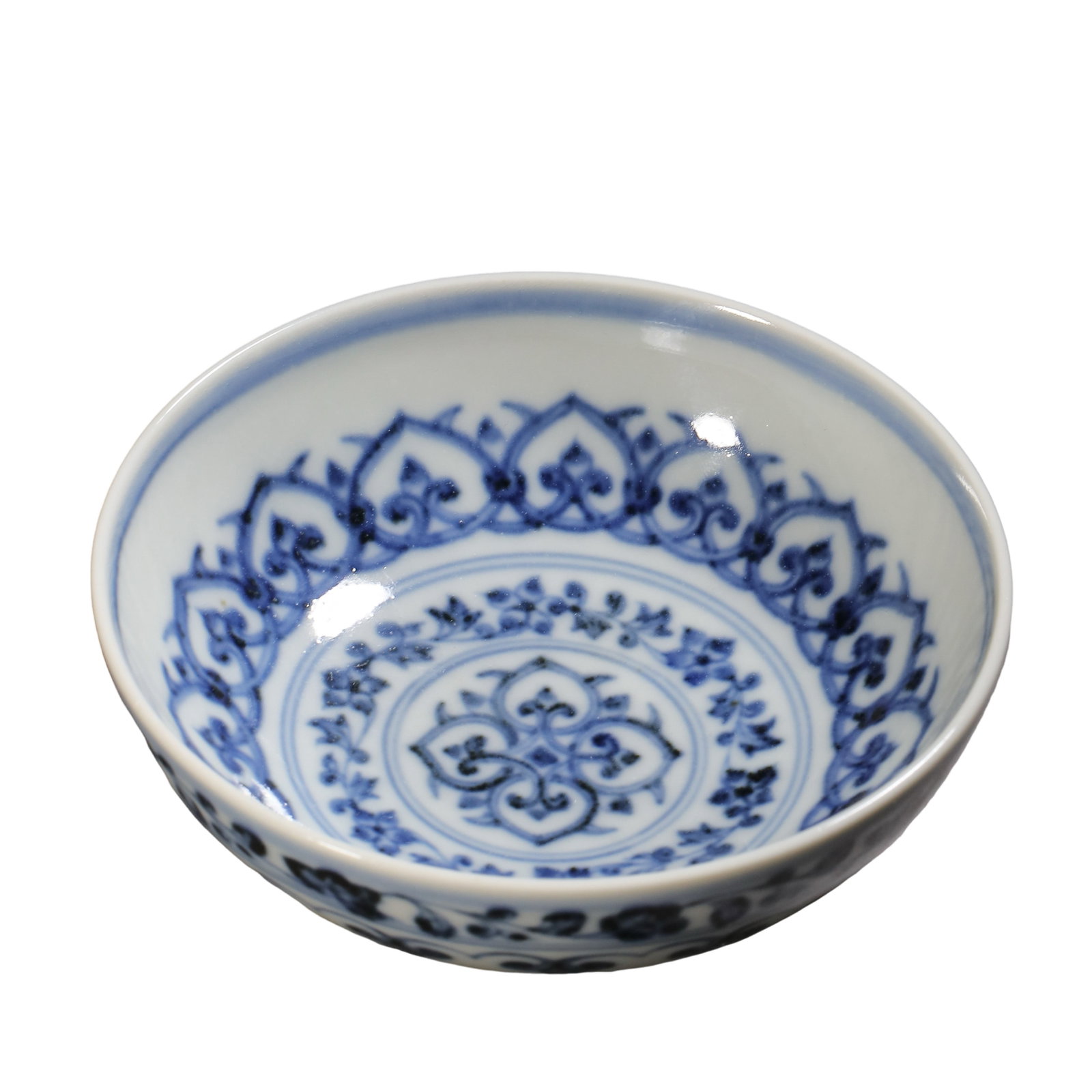 Ming?Xuande Underglaze?Blue Bowl?Shaped Cup with Composite Floral Scrolls,15th Century CE: Dimensions:Mouth diameter 9.8cm(3.86in),overall height 3.3cm(1.30in),15th Century CECondition & Provenance:The cup is fully intact without cracks,chips or modern restoration.The porcelain body is fine