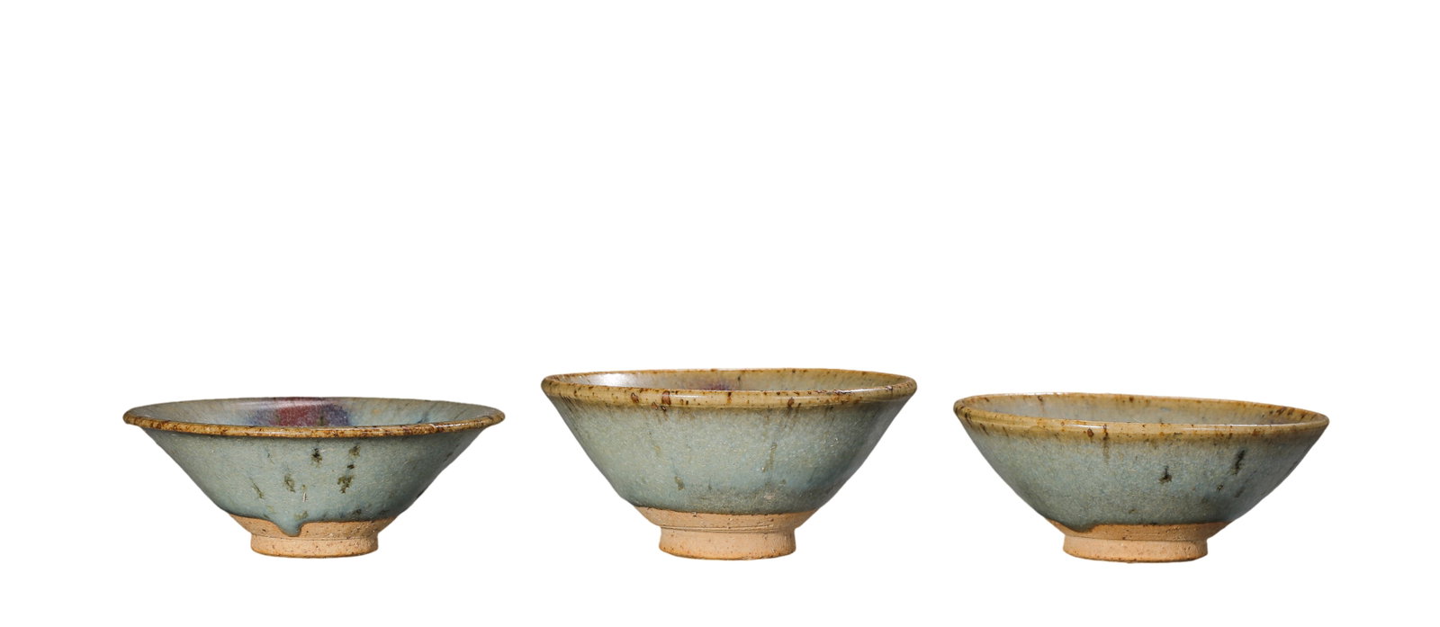 Yuan?Dynasty Jun?Yao Sky?Blue Glaze Purple?Splash Conical Tea Bowls Group of: Dimensions:Mouth diameter 9.8cm(3.86in),overall height 4.5cm(1.77in),13th?14th Century CECondition & Provenance:All three tea bowls are fully intact,free of cracks,chips,rim fleabites and modern resto