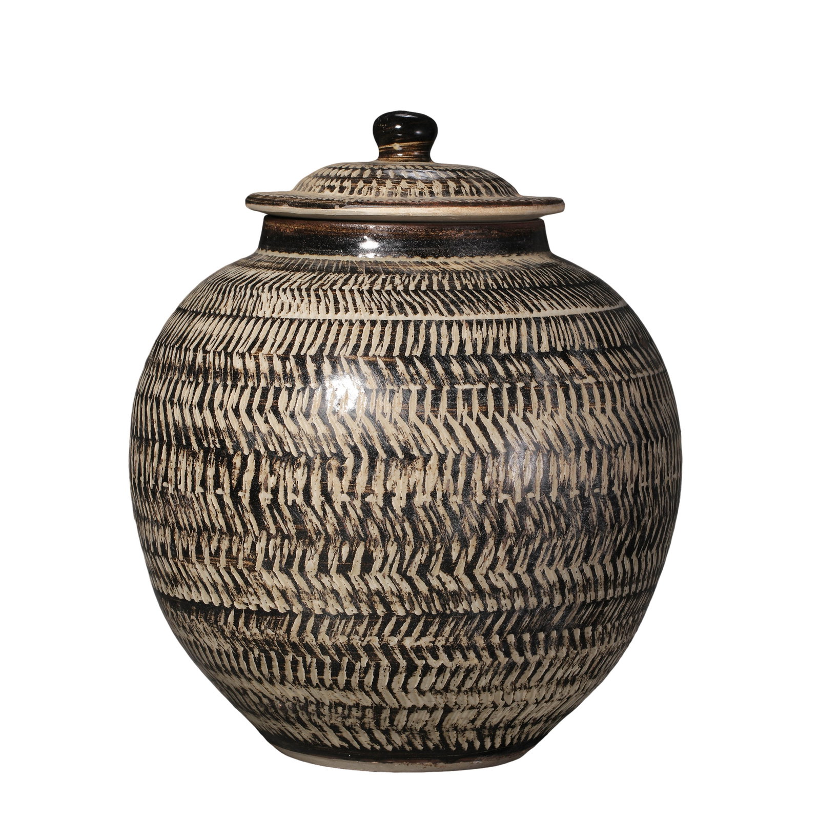 Song Cizhou Kiln Black & White Jump-Carved Pattern Covered Jar,10th-13th Century CE: Dimensions:Overall height 25.5cm(10.04in),10th-13th Century CECondition & Provenance:The jar and its matching original cover are fully intact as a complete set,free of cracks,edge chips,glaze peeling 