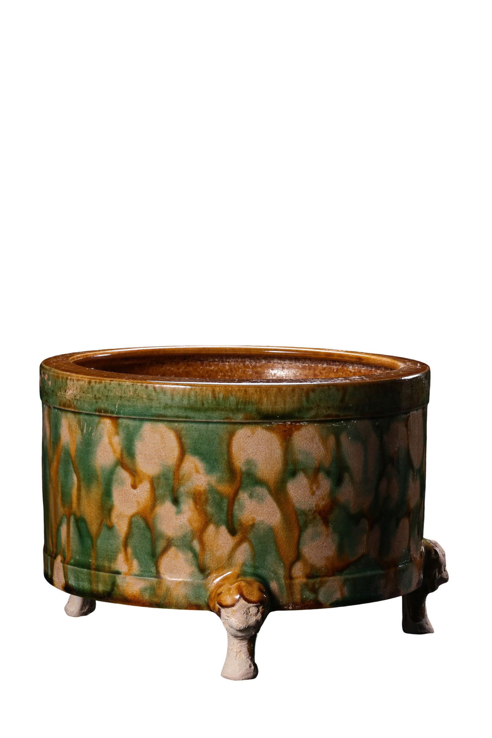 Tang Dynasty Sancai Green?Amber Splashed Glaze Tripod Censer,7?10th Century CE: Dimensions:Mouth Diameter 17.5cm(6.89in),Overall Height 12.5cm(4.92in),7?10th Century CECondition & Provenance:The censer body is intact without penetrating cracks.Three molded beast?form feet are ful