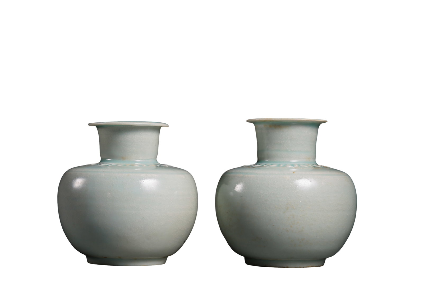 Song Dynasty Ying?Qing Celadon Pair of Mould?Carved Lotus Pattern Jars,12?13th?century: Dimensions:Single jar Height 12cm(4.72in),Mouth Diameter 7cm(2.76in),12?13th century Song?dynasty Qingbai porcelainCondition & Provenance:The pair is fully preserved without cracks or chips.Original Y