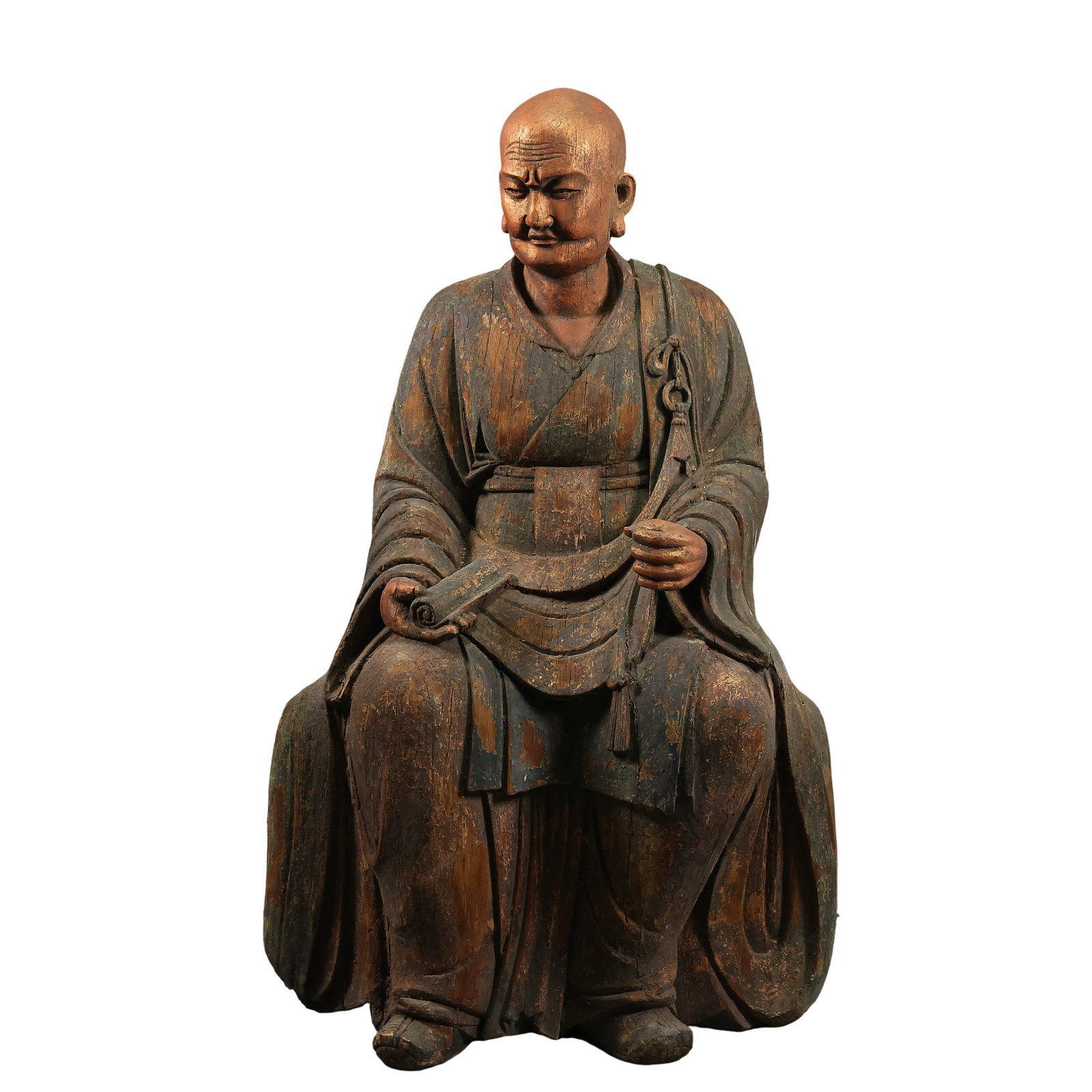 Ming Dynasty Wooden Painted Seated Arhat Statue Holding Sutra Scroll,14th-17th century Chinese: Dimensions:Overall Height 101cm(39.76in),Base Width 58cm(22.83in),14-17th century Ming wooden Buddhist carvingCondition & Provenance:The entire statue is carved from a single solid timber block, the f