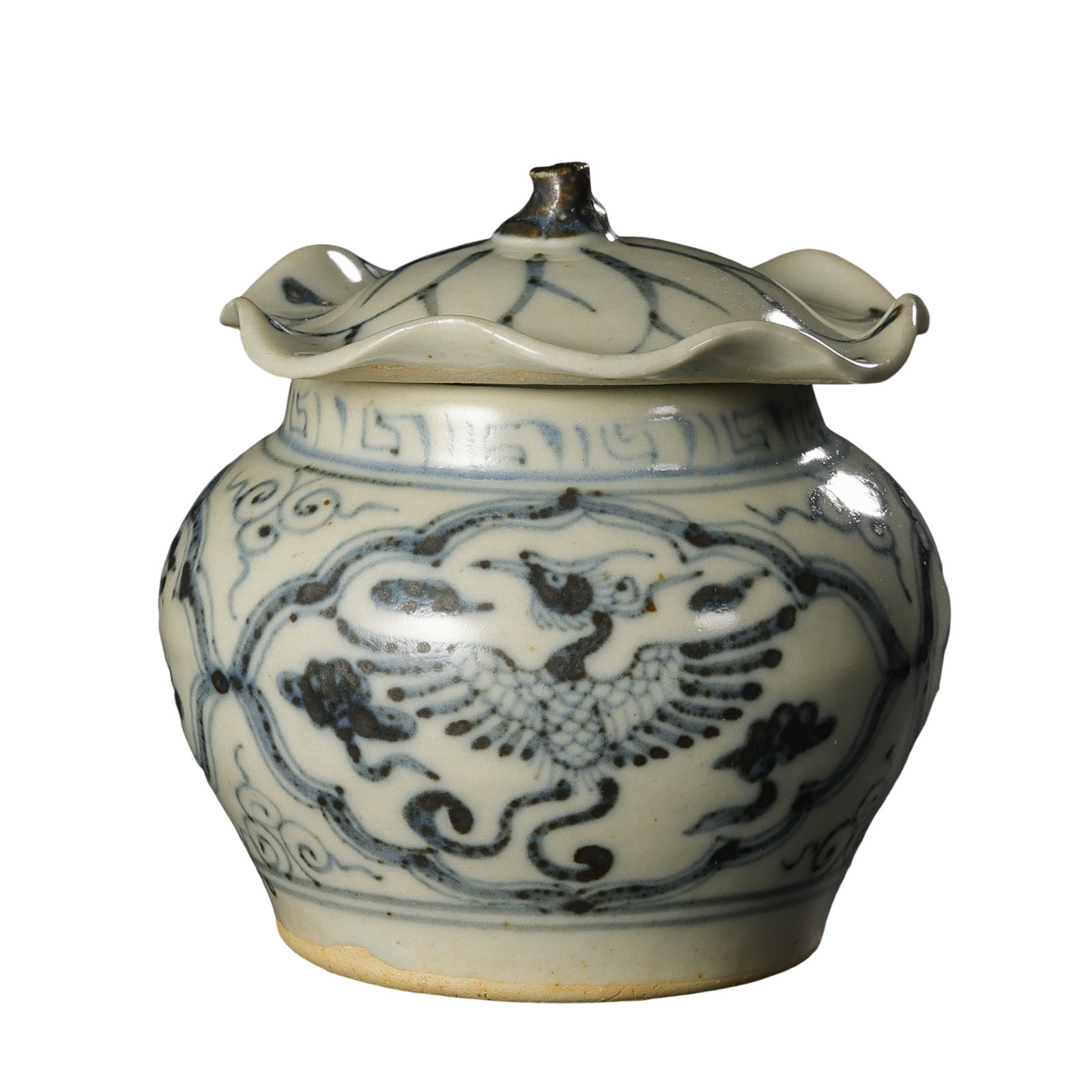 Yuan Dynasty Blue and White Lotus Leaf Covered Jar with Medallion Phoenix Motif,14th century Chinese: Dimensions:Overall Height 7.5cm(2.95in),14th century Yuan Dynasty porcelainCondition & Provenance:The jar body and matching lotus leaf cover are fully original and intact,free of cracks,chips and rest