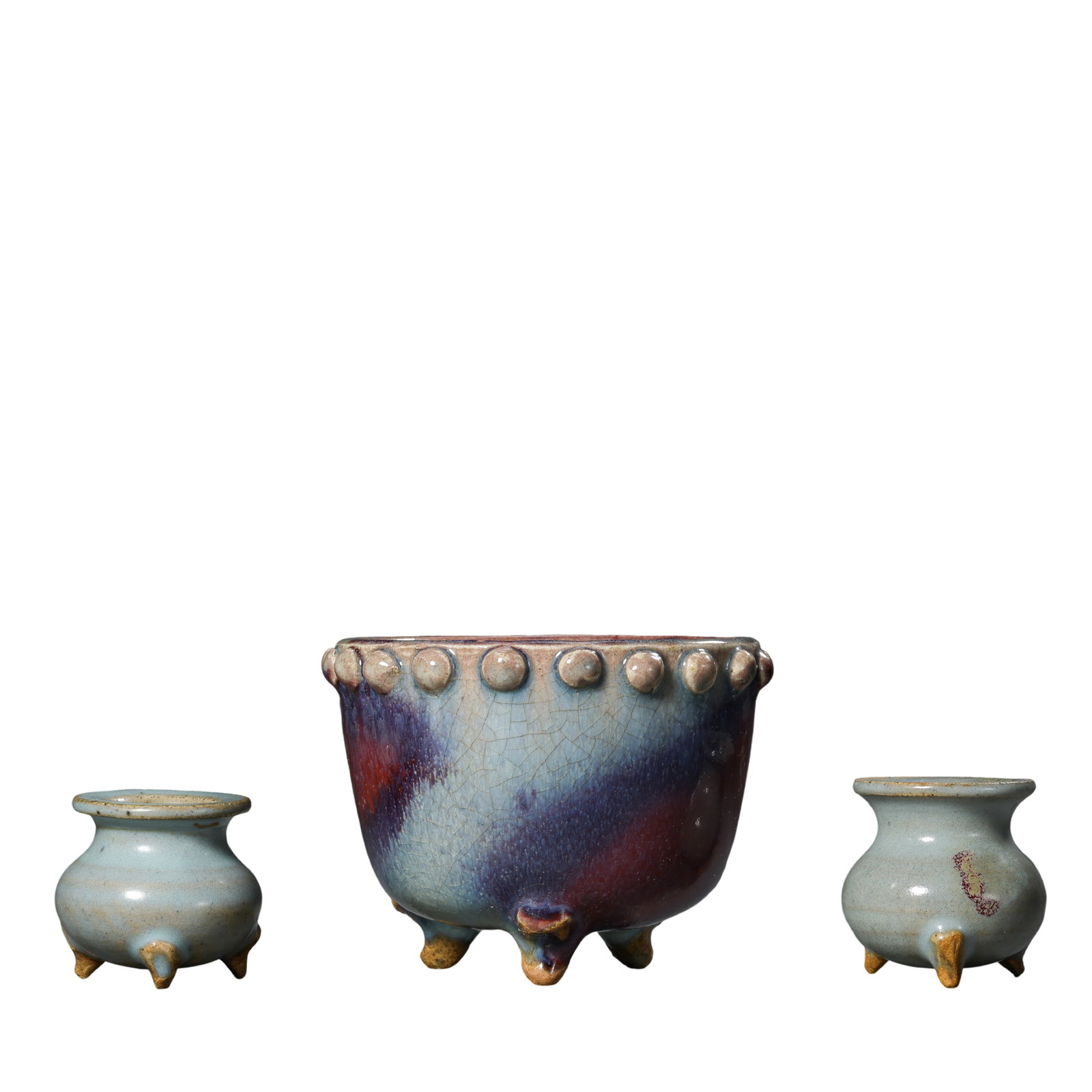 Yuan Dynasty Jun Ware Sky?Blue Glaze Tripod Censer With Bead?Stud Rim and Two Miniature Jun: .Dimensions:Large censer Diameter 10cm(3.94in),Height 7.5cm(2.95in);Two small qin censers Diameter 4.7cm(1.85in),Height 4.4cm(1.73in),13th?14th century Yuan?era Jun kiln waresCondition & Provenance:Al