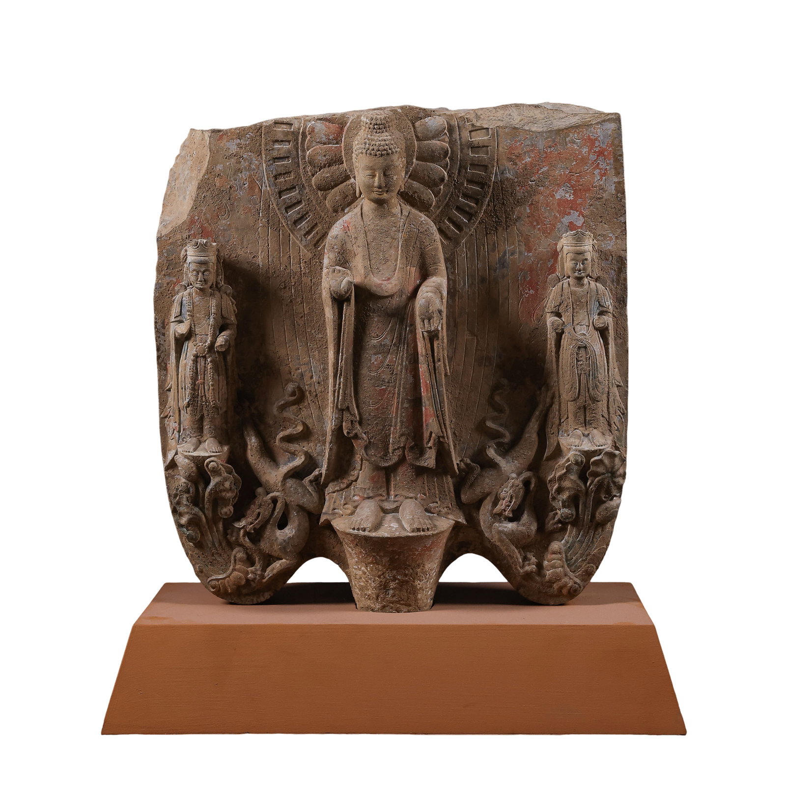 Northern Qi Dynasty Painted Sandstone Stele Carved with One Buddha, Two Bodhisattvas and Dragon: Dimensions: Height 62cm (24.41in), Base Width 48cm (18.90in), Northern Qi Dynasty (6th Century A.D.)Condition & Provenance: The sandstone stele retains its main body intact, only minor edge chipping o