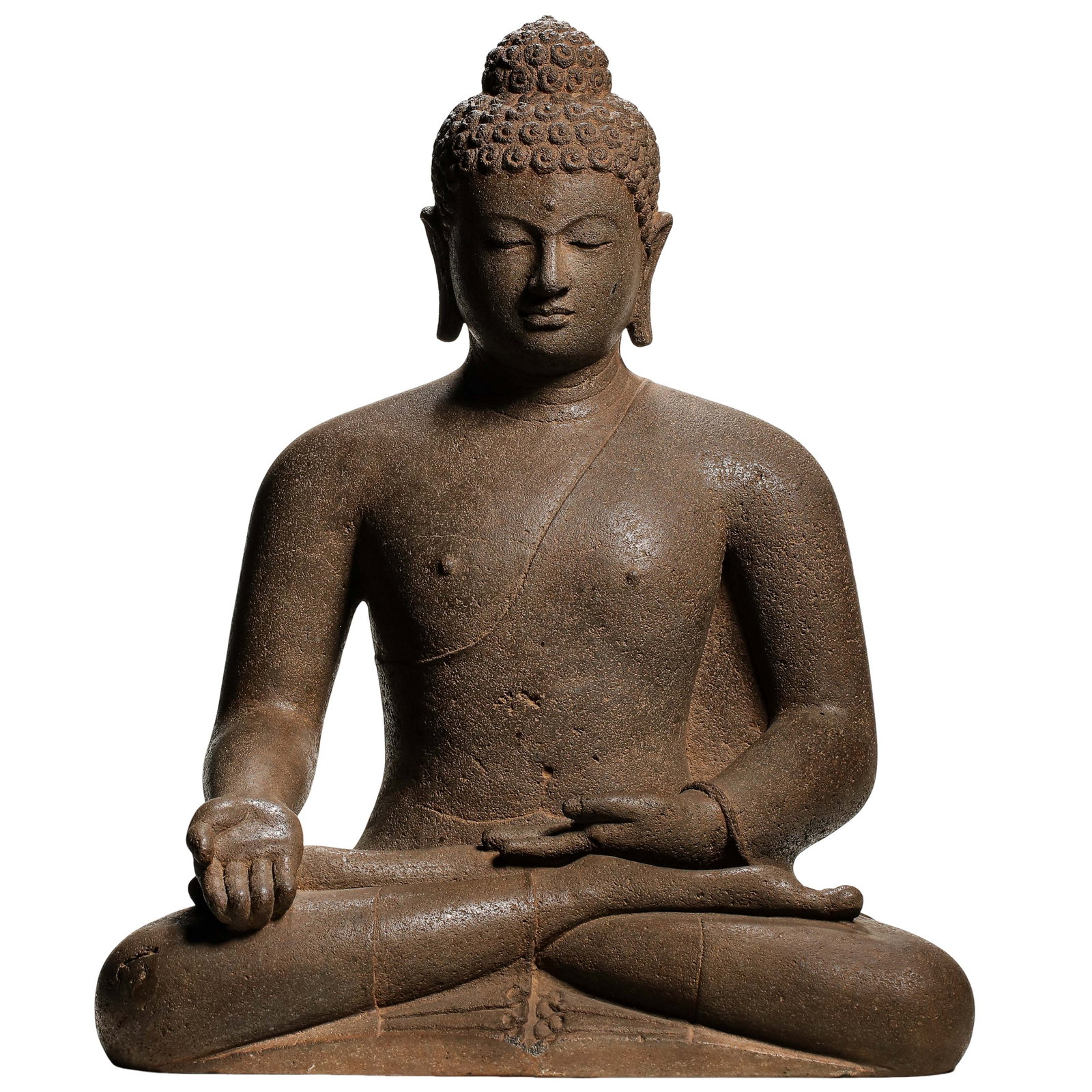 Volcanic Stone Seated Buddha Shakyamuni in Enlightenment Mudra, Ancient Southeast Asian Buddhist: Dimensions: Overall Height 52cm (20.47in), Shoulder Width 42cm (16.54in), 14th to 15th CenturyCondition & Provenance: Category: Buddhist Sculpture, primary market destination Bangkok. This stone Buddh